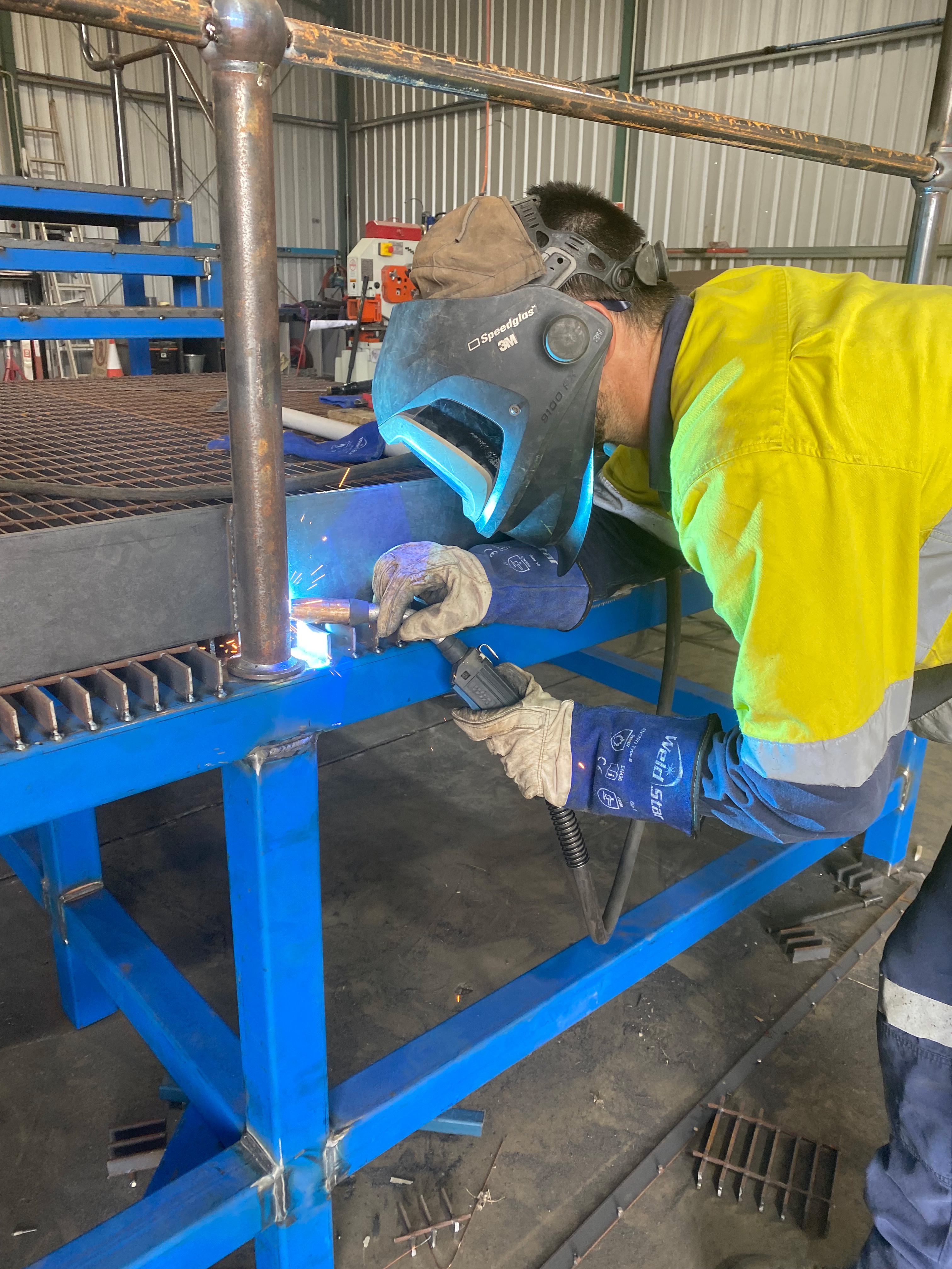 Welder Fabricating Steel platform